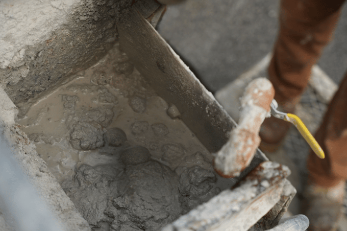 Wet limestone slurry being mixed