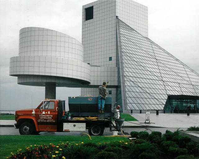 Man standing on concrete leveling truck