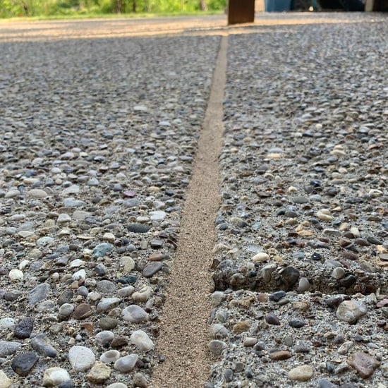 Caulked expansion joint between two concrete slabs