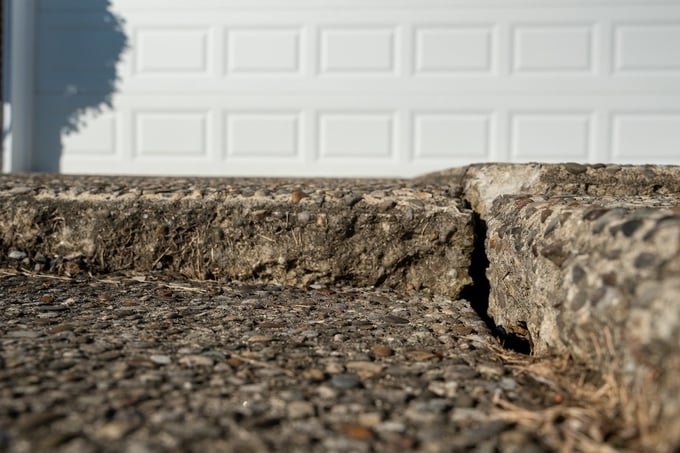 Concrete driveway slabs that have settled over time