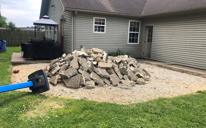 Concrete patio rubble after demolition of backyard concrete patio