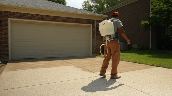 Sealing concrete driveway with penetrating concrete sealer