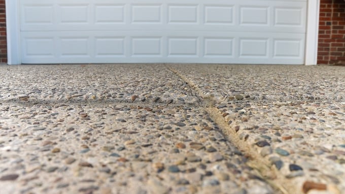 Concrete driveway lifted back into place after concrete leveling