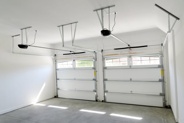 Garage floor concrete slabs and garage doors