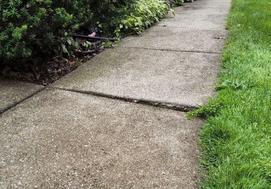 Sidewalk slab has settled causing trip hazard