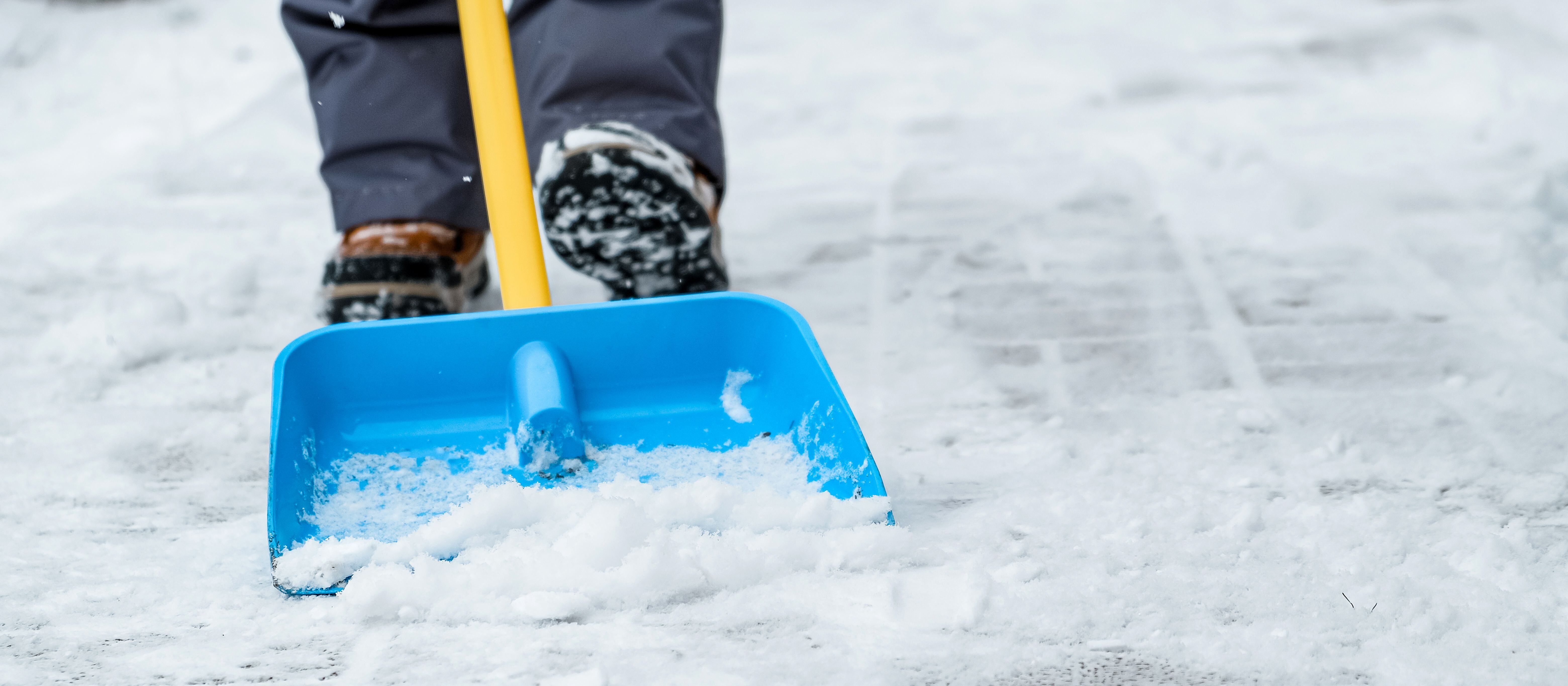 Shoveling snow off driveway