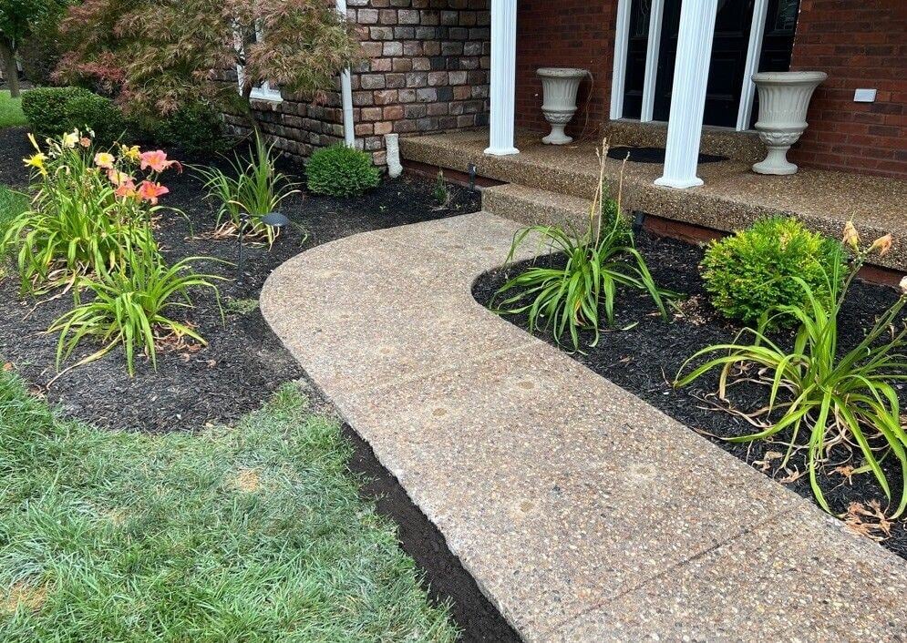 Soil level even with concrete walkway slabs